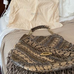 Jimmy choo snake skin purse.